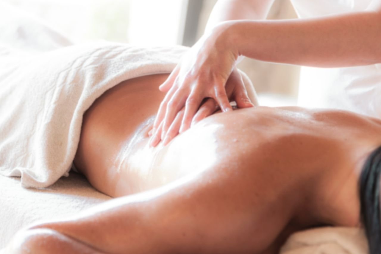 Services A soothing massage session in a serene spa environment promoting relaxation and wellness.